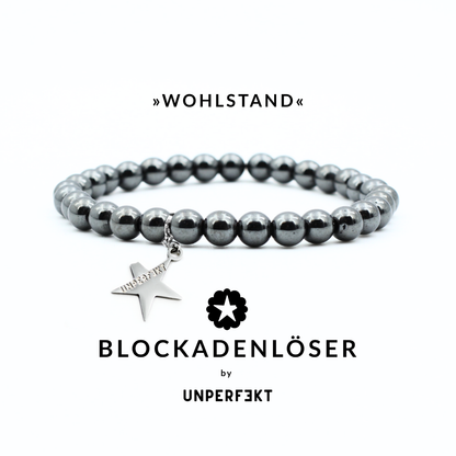 »Wohlstand« Blockadenlöser aus echtem Hämatit inkl. abgebrochener Stern